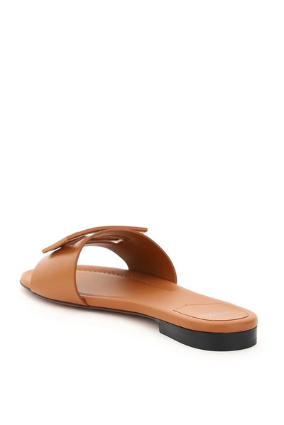 Shop Fendi Ff Logo Plaque Sandals In Brown