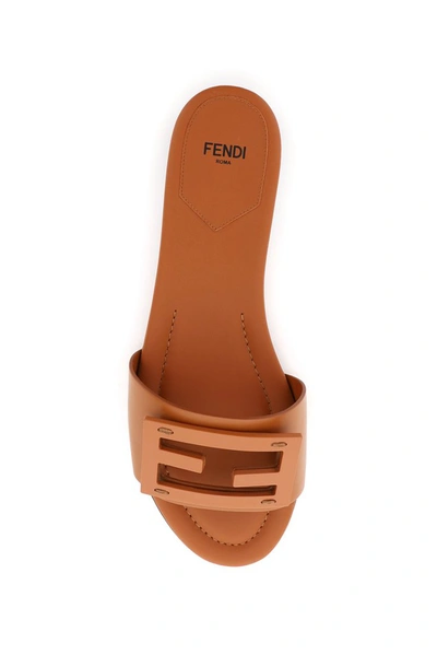 Shop Fendi Ff Logo Plaque Sandals In Brown