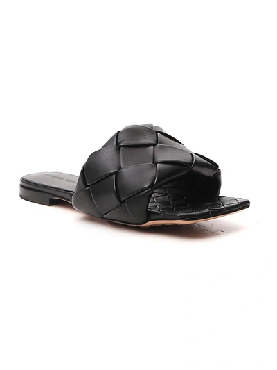 Shop Bottega Veneta The Lido Flat Sandals In Black