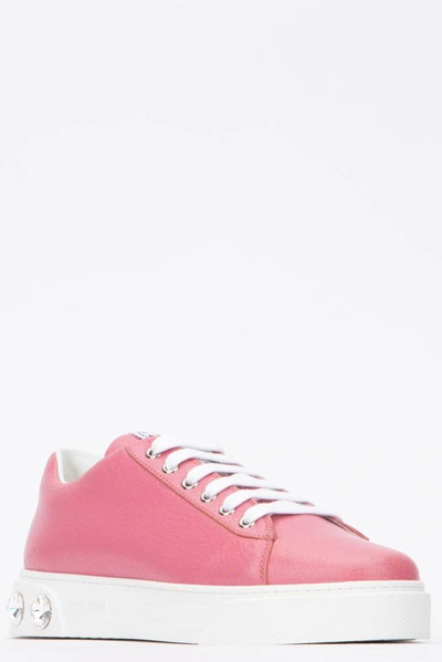 Shop Miu Miu Crystal Embellished Sneakers In Pink