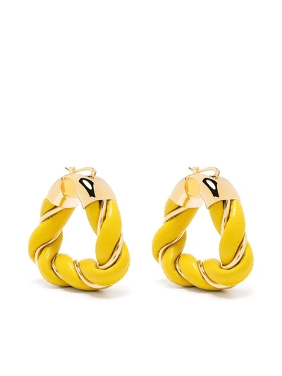 Shop Bottega Veneta Twisted Triangle Hoop Earrings In Gelb