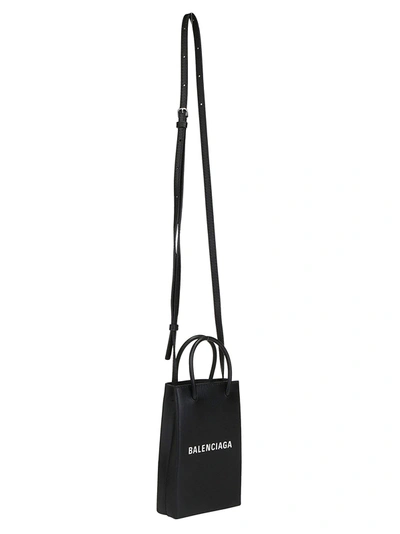 Shop Balenciaga Shopping Phone Holder Bag In Black