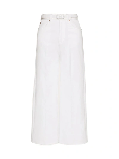 Shop Valentino Belted Denim Pants In Optic White