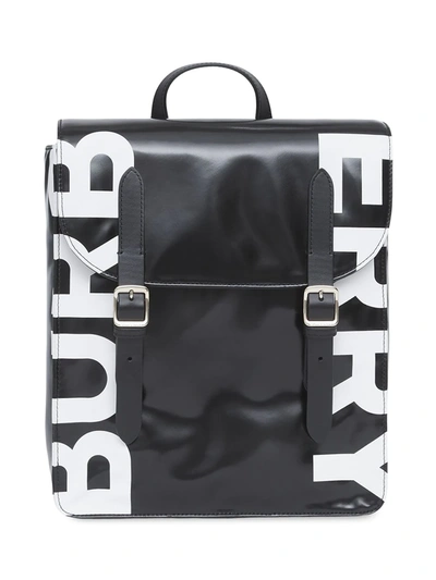 Shop Burberry Logo-print Coated-canvas Backpack In Schwarz