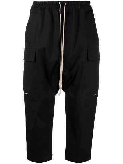 Shop Rick Owens Dropped-crotch Cargo Pocket Cropped Trousers In Black
