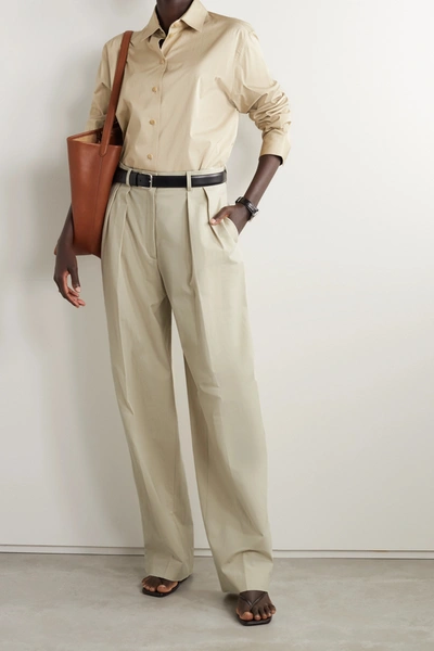 The Row Igor Pleated Cotton Wide-leg Trousers In Neutrals | ModeSens