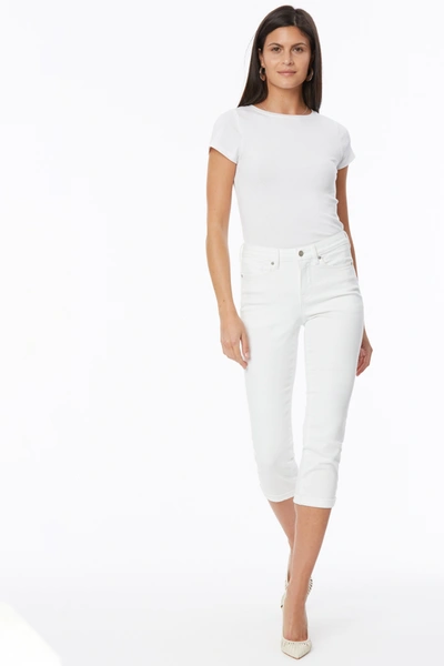 Shop Nydj Chloe Skinny Capri Jeans In White