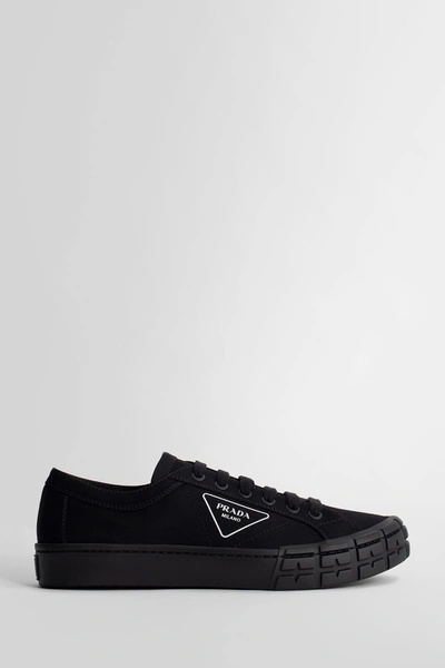 Shop Prada Sneakers In Black & White