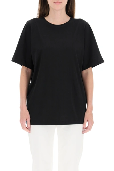 Shop Totême Oversized Cotton T-shirt In Black (black)