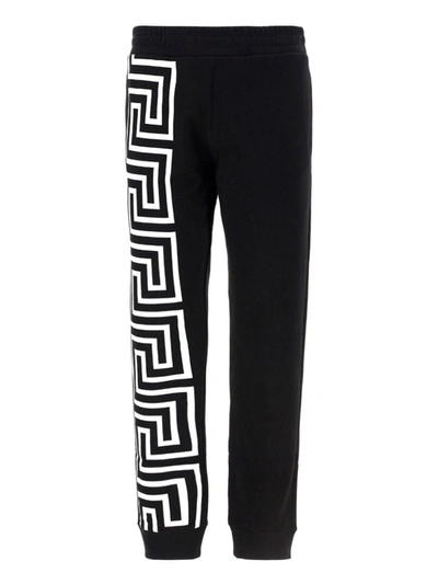 Shop Versace Greca Motif Print Sweatpants In Black