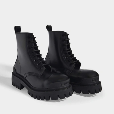 Shop Balenciaga Strike Bootie L20 Ankle Boots In Black