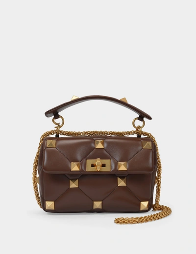 Shop Valentino Roman Stud Medium Shoulder Bag In Brown