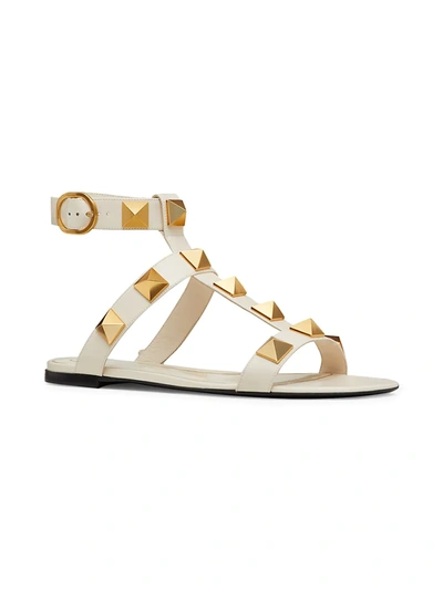 Shop Valentino Roman Stud Leather Sandals In White