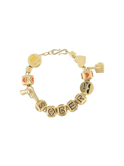 Shop Natasha Zinko Sober Charm Bracelet In Gold