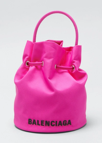 Shop Balenciaga Wheel Xs Drawstring Bucket Bag In Fluo Pink Black