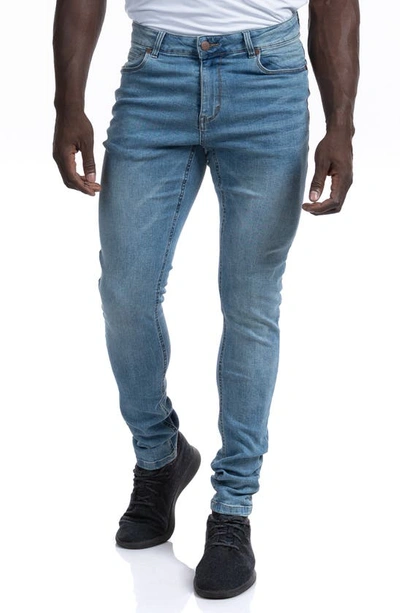 Shop Barbell Straight Athletic Fit Jeans In Light Wash