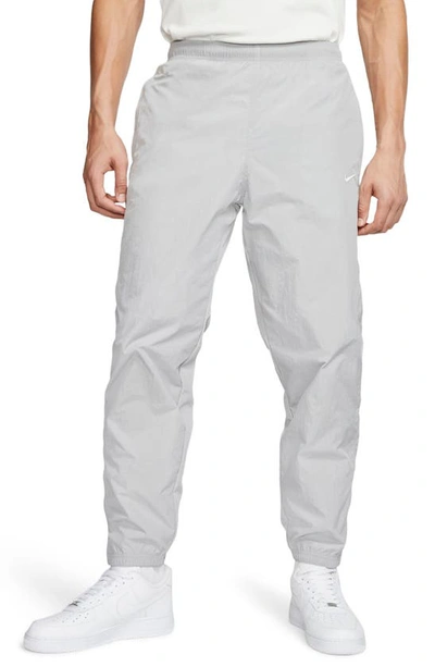 Shop Nike Lab Collection Nrg Nylon Track Pants In Smoke Grey/ White