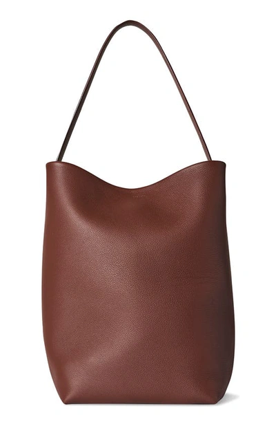 Shop The Row Park North/south Leather Tote In Walnut