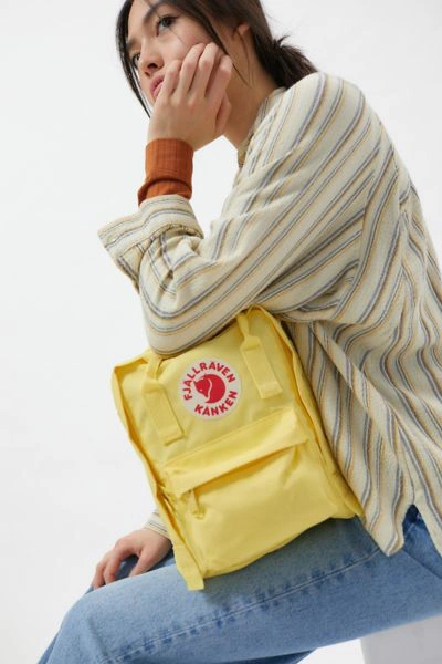 Shop Fjall Raven Kånken Mini Backpack In Light Yellow