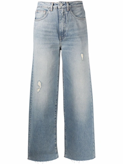 Shop Totême Distressed Wide-leg Jeans In Blau