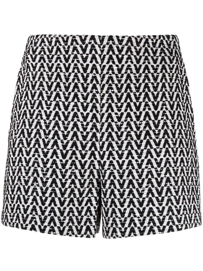 Shop Valentino All-over Logo Shorts In Black