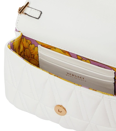 Shop Versace Virtus Small Leather Crossbody Bag In White