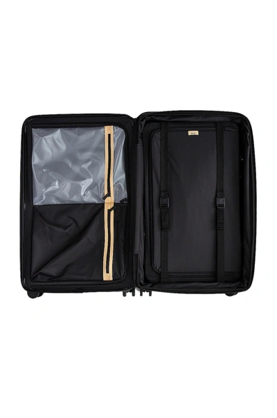 Shop Beis The 29 Check-in Roller In Black