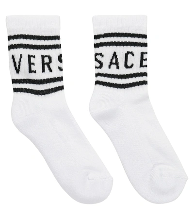 Shop Versace Logo Jacquard Cotton-blend Socks In 黑色