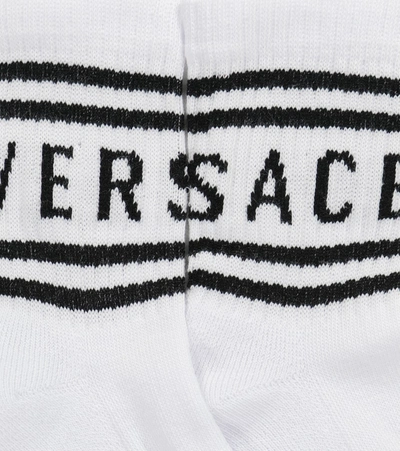 Shop Versace Logo Jacquard Cotton-blend Socks In 黑色