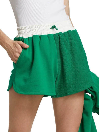 Shop Staud Bungee Track Shorts In Clover