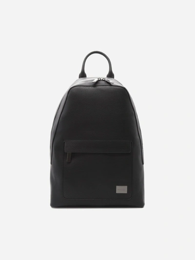 Shop Calvin Klein Round Backpack In Textured Faux Leather With Logo Plate In Black