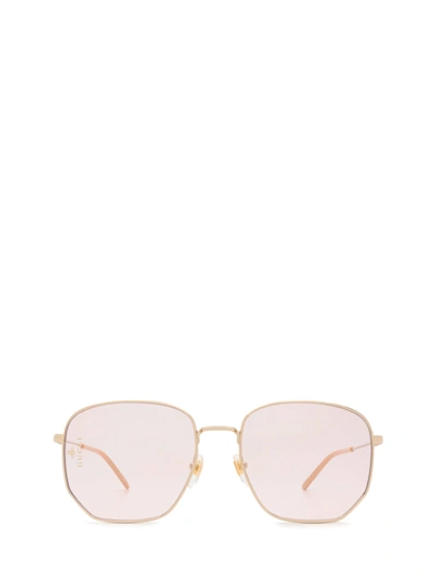 Shop Gucci Gg0396s Gold Sunglasses