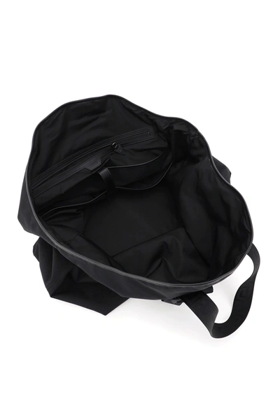 Shop Versace Weekend Bag In Black