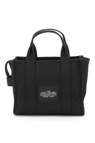 Shop Marc Jacobs (the) The Mini Traveler Tote Bag In Black