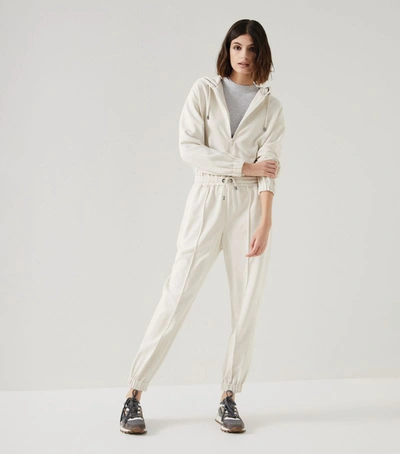 Shop Brunello Cucinelli Cotton Tapered Jumpsuit In Neutrals