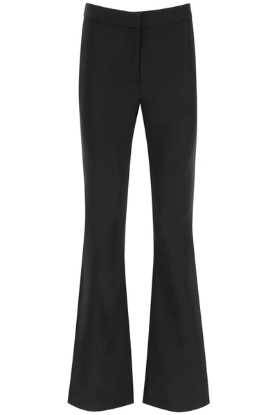 Shop Moschino Flared Satin Trousers In Black