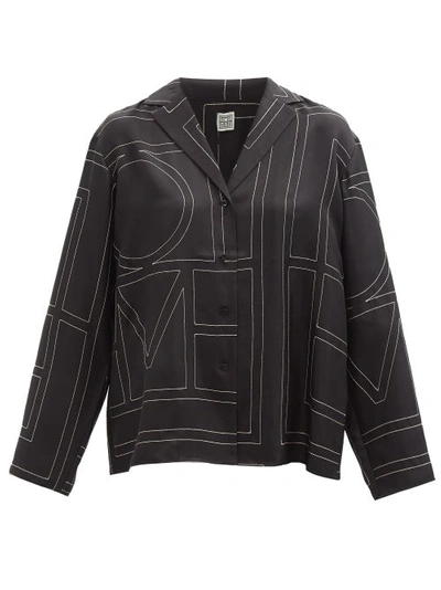Shop Totême Monogram-embroidered Silk-twill Pyjama Top In Black