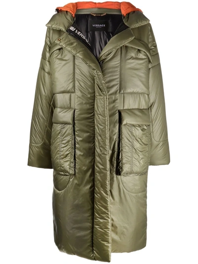 Shop Versace Hooded Puffer Coat In Grün