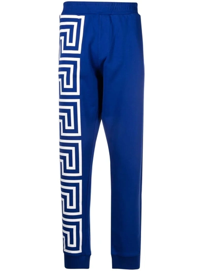 Shop Versace Greca-print Track Pants In Blue