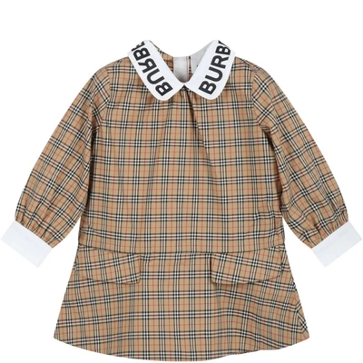 Shop Burberry Beige Dress For Baby Girl With Black Logo