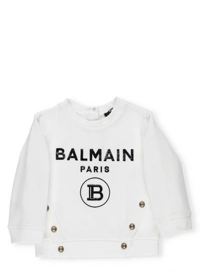 Shop Balmain Loged Sweatshirt With Buttons In White