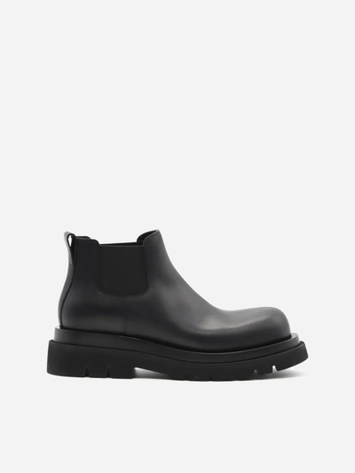 Shop Bottega Veneta Lug Ankle Boots In Calfskin In Black