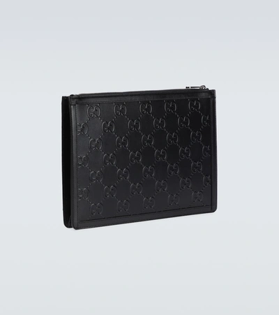 Shop Gucci Ouverture Gg Embossed Pouch In Black