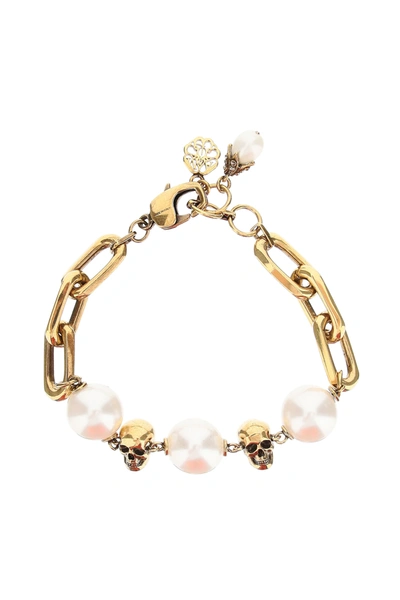 Shop Alexander Mcqueen Pearls And Skulls Bracelet In Gold