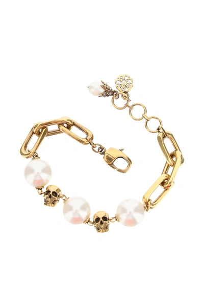 Shop Alexander Mcqueen Pearls And Skulls Bracelet In Gold