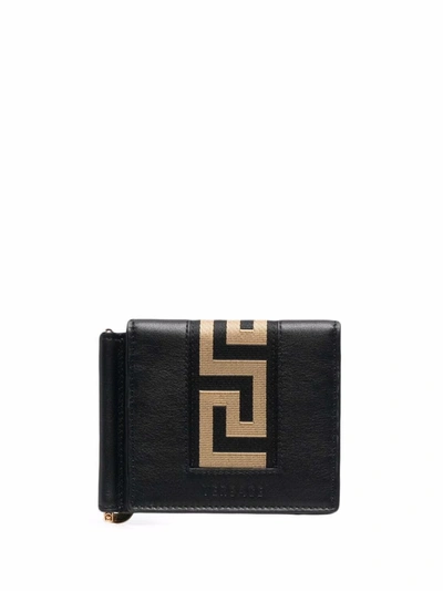 Shop Versace Greca-pattern Folded Wallet In Schwarz