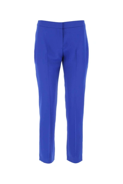 Shop Alexander Mcqueen Cropped Tailored Pants In Blue