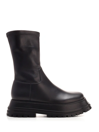 Shop Burberry Chunky Sole Boots In Black