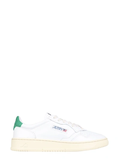 Shop Autry Leather Snekaers In White