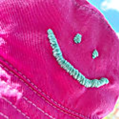 Quillattire Pink Unisex Smiley Face Bucket Hat In Bucket
